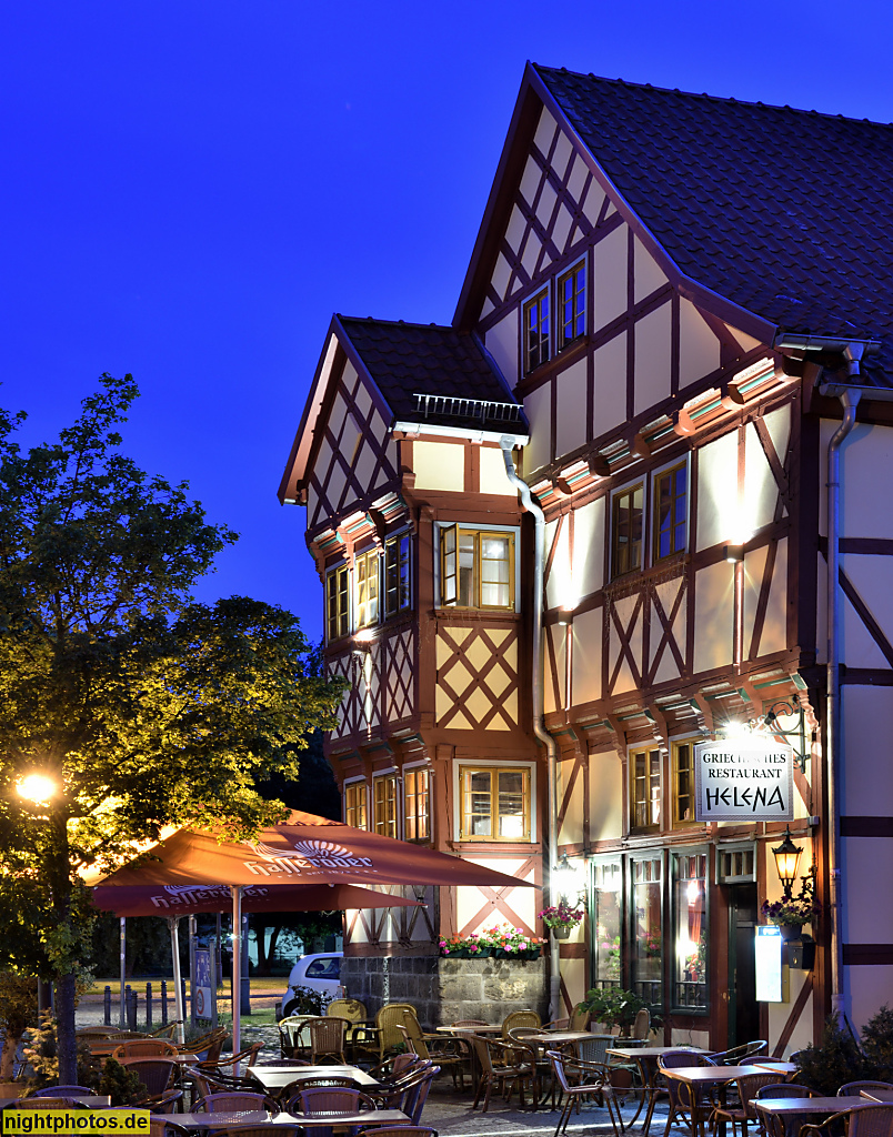 Quedlinburg. Restaurant Helena. Wohnhaus erbaut 1676 in Fachwerk mit Erker. Werksteinsockel. Saniert 1951-1952. Word 12